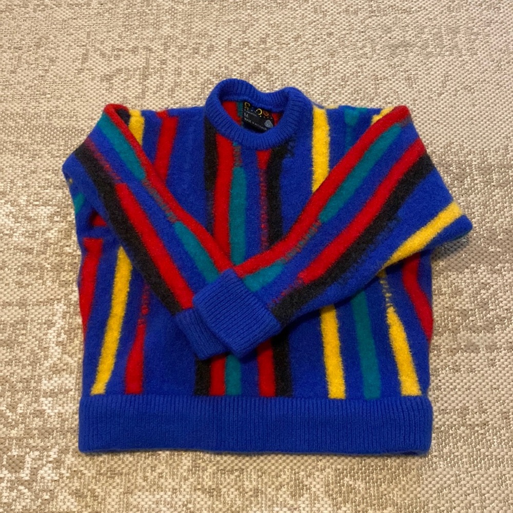 coogi sweater.